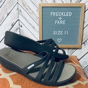 Grey and tan strappy Crocs sandal with heel